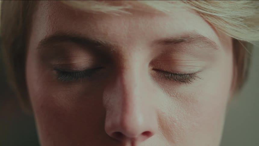 Close up of a blonde womans eyes