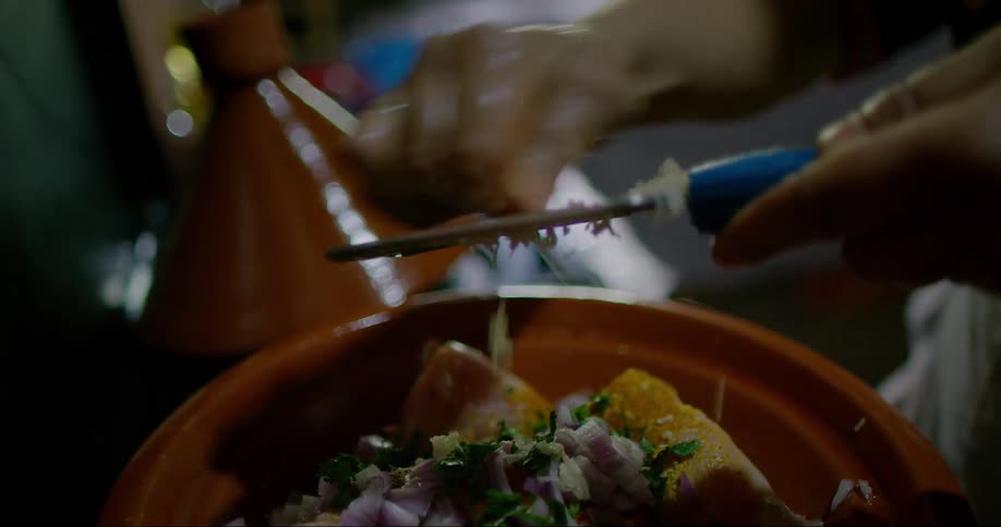 A person is cooking a meal