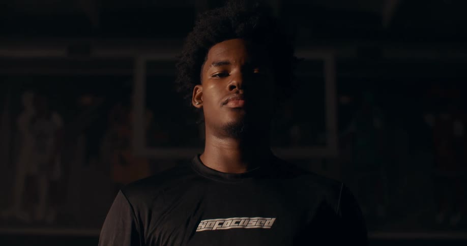 Portrait of a young man in a lowlight environment