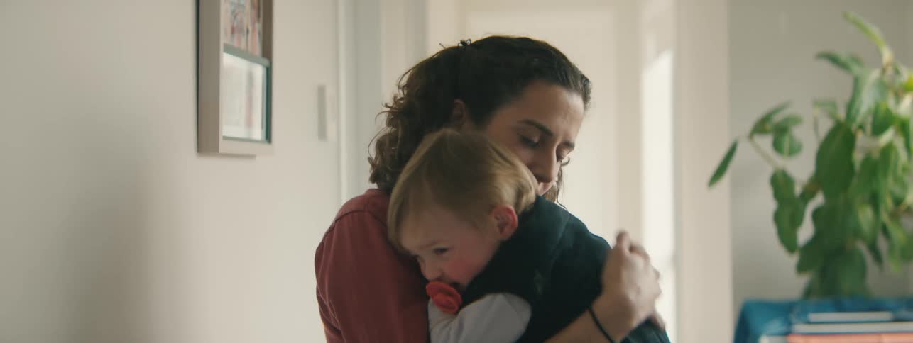 A clip of a mother playing with her kid
