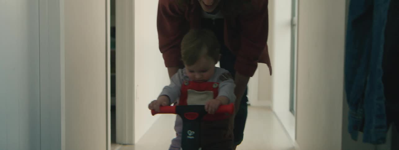 A clip of a mother playing with her kid