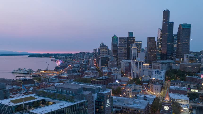 Low traverse over the stadium district and Pioneer Square area of Seattle