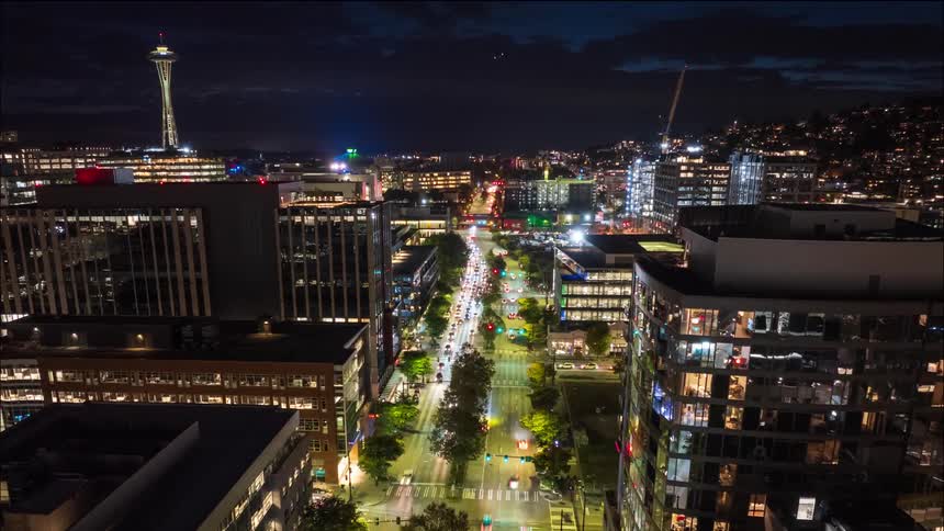 Commuters and residents move along Mercer Street in the heart of South Lake Union