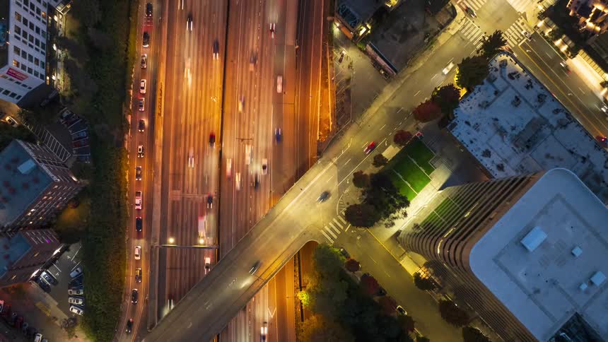 Top down view of dynamic traffic on Interstate 5 and surrounding arterial streets of downtown Seattle