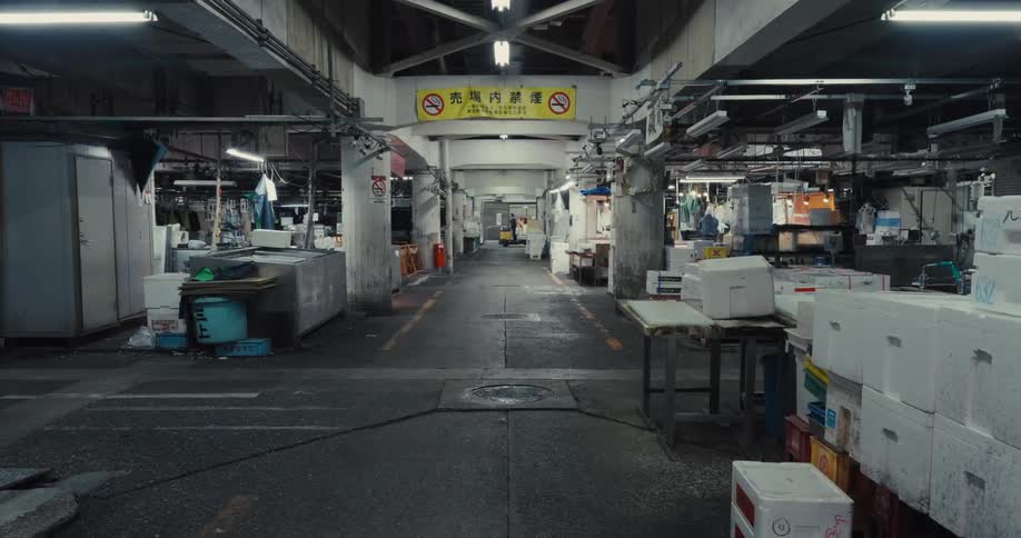 Indoor market with stalls and fishmongers