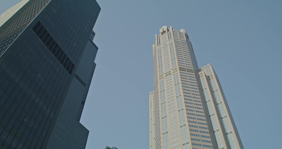 Coming out of an underpass to two skyscrapers in Chicago
