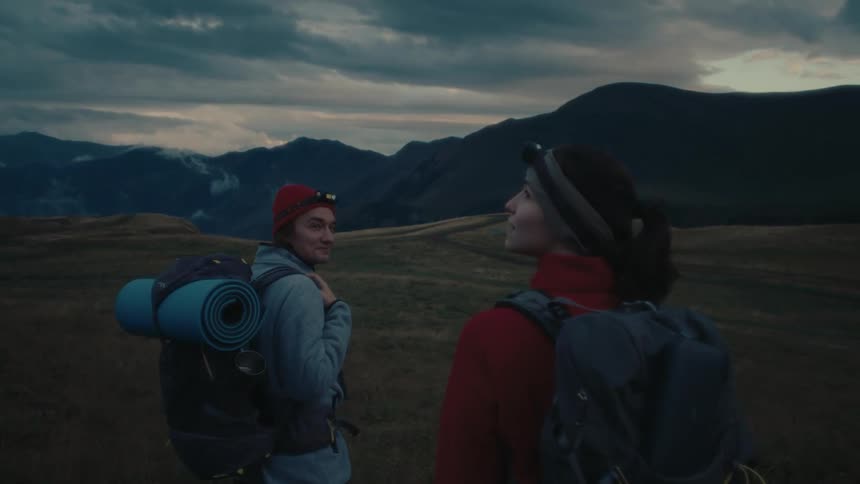 A clip of a male and a female hiker