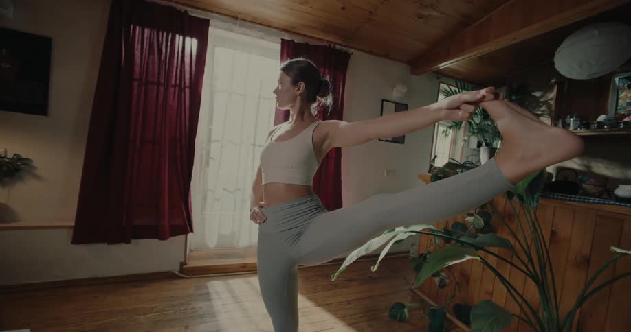 Woman stretching her leg in yoga position