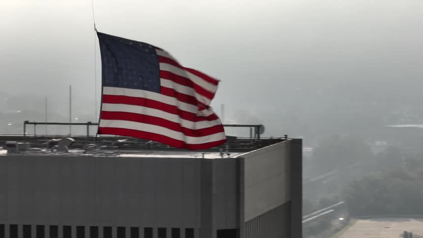 Aeria view of an american flag waving in the wind