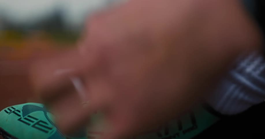 Close up of a persons hands tying their shoelaces