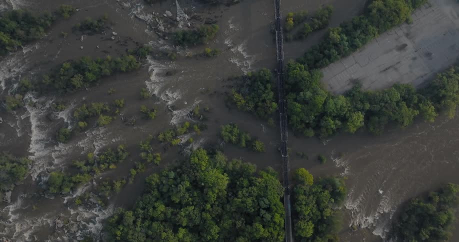 A bridge runs over the river