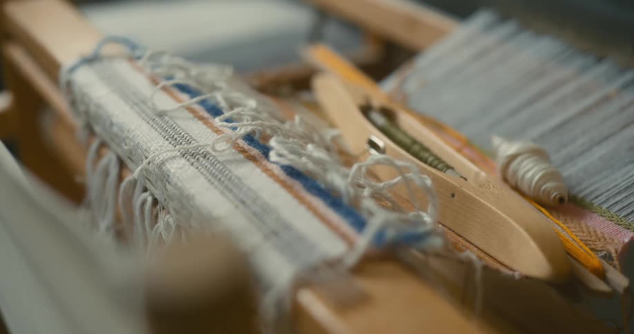 Close up of hand weaving equipment