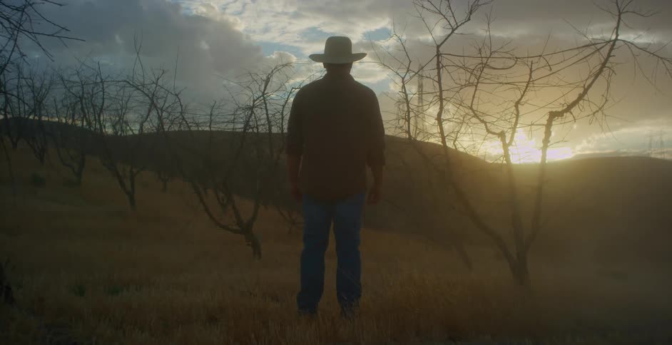 A man is watching the sunrise