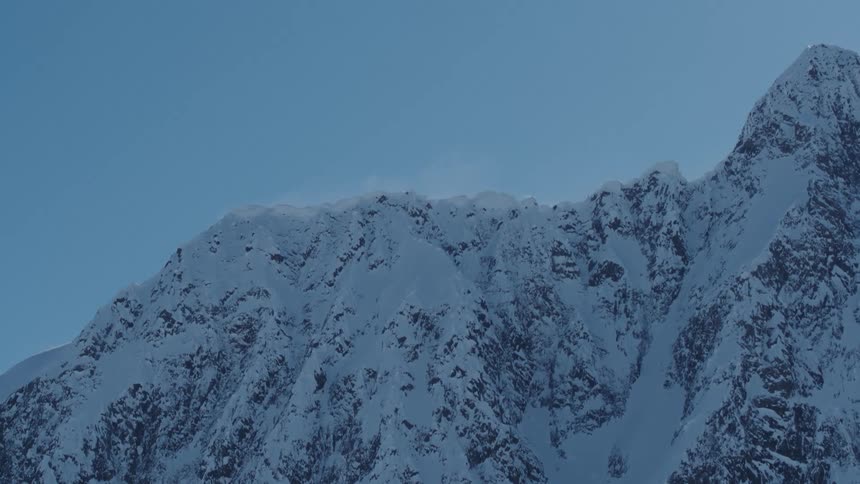 Mountain range against a blue sky
