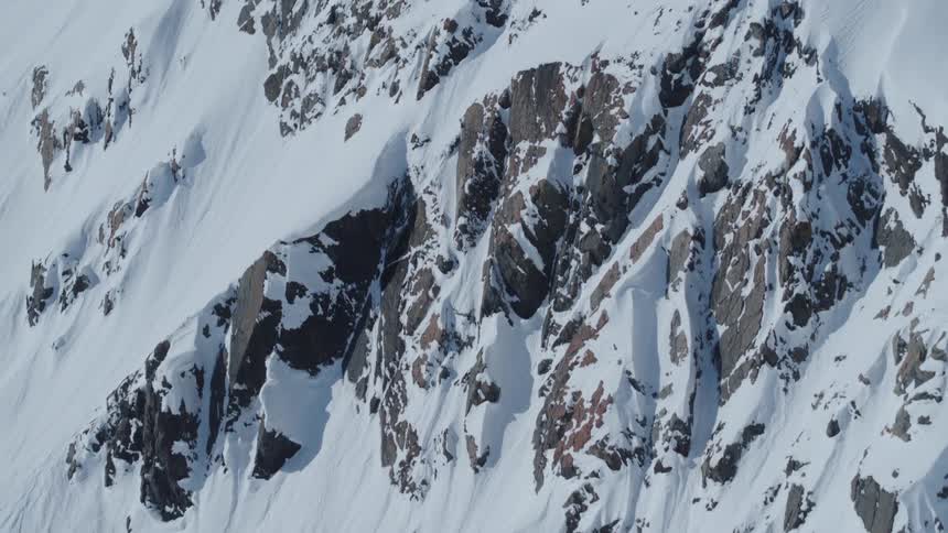 Aerial view of a snowcovered mountain wall