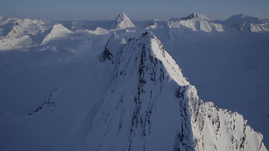 Aerial view of snowcovered mountain cliffs