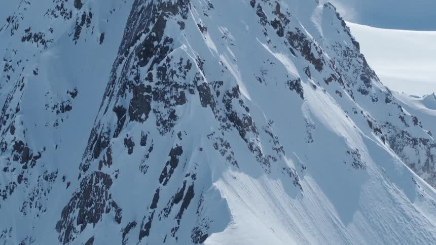 Aerial view of a steep snowcovered mountain slope