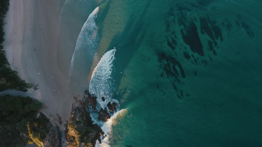 Aerial view of a beach with turquoise blue sea
