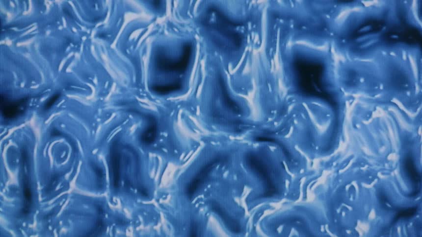 Shiny blue thick liquid swirling in various patterns
