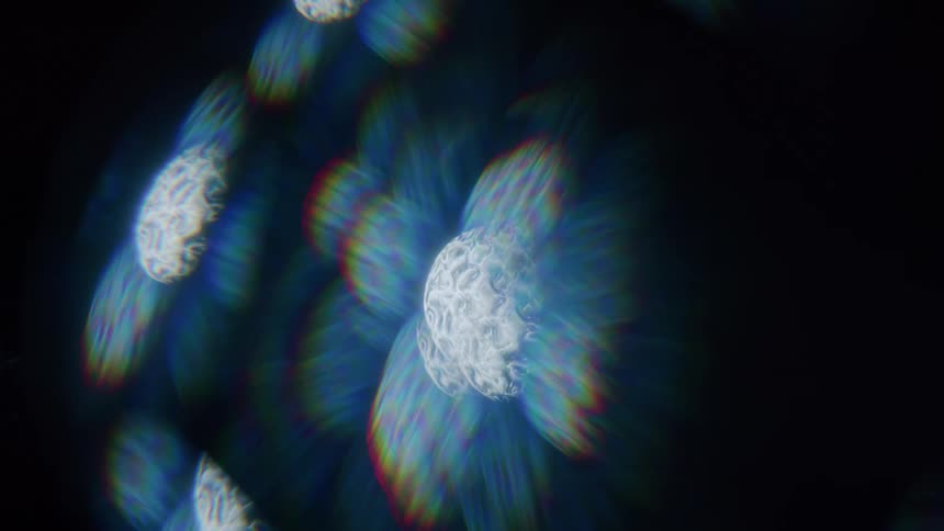 Bright light flares in different colors and contrasts with the black background