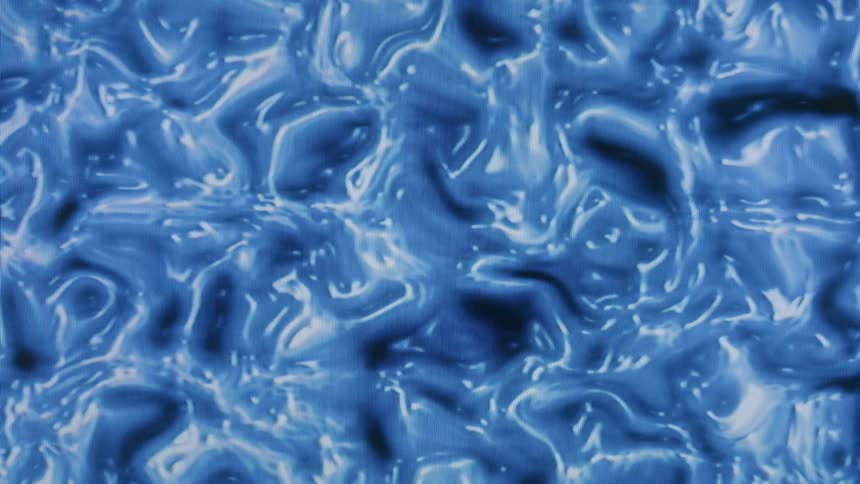 Blue slimy liquid swirling in various patterns
