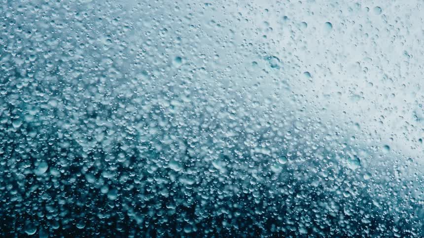Water droplets swirl about
