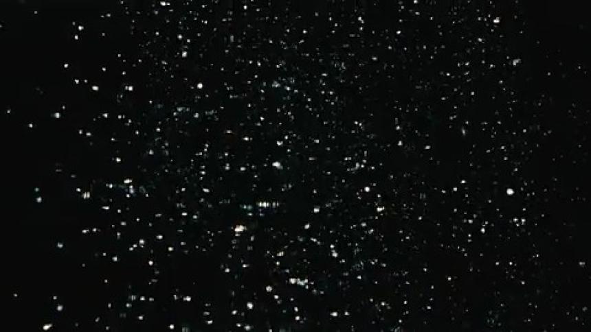 Dust particles fall