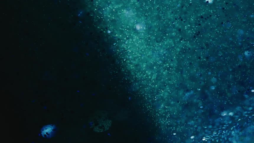 Abstract blue glitter liquid