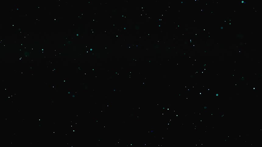 A dark blue liquid is sprinkled with small blue sparkly dots