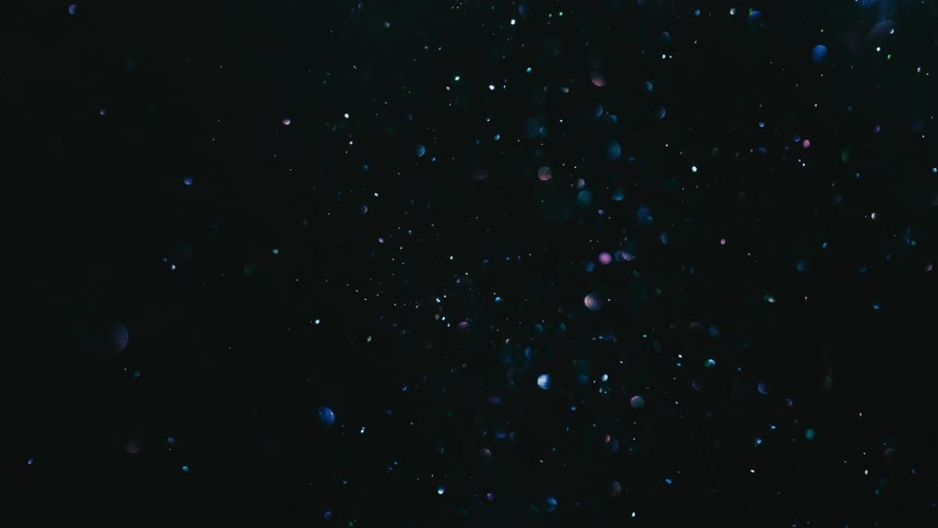 Particles floating in dark water