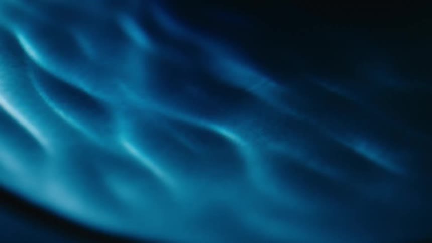 Mixture with a dimpled and textured surface flows rapidly