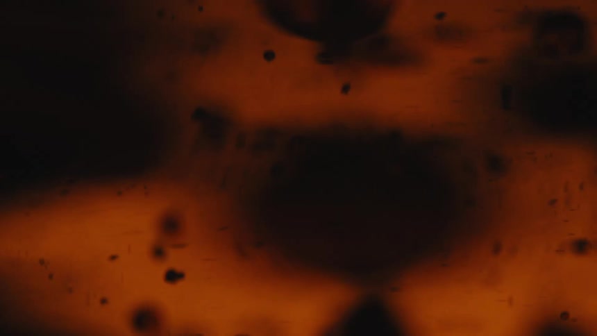 Dense liquid with falling bubbles