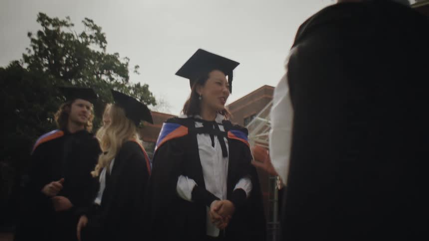 Group of students with graduation gowns