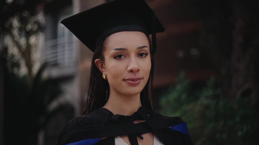 Woman with graduation gown
