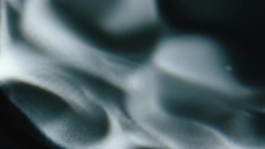 Extreme close up of a white object in abstract rotating motion
