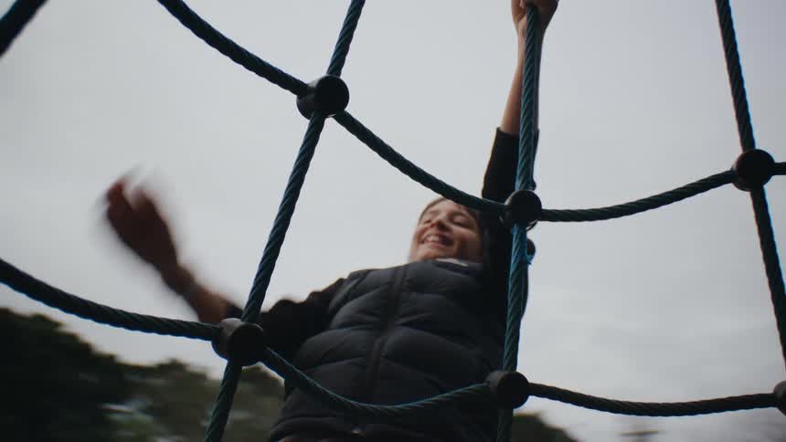 A clip of a kid climbing a net