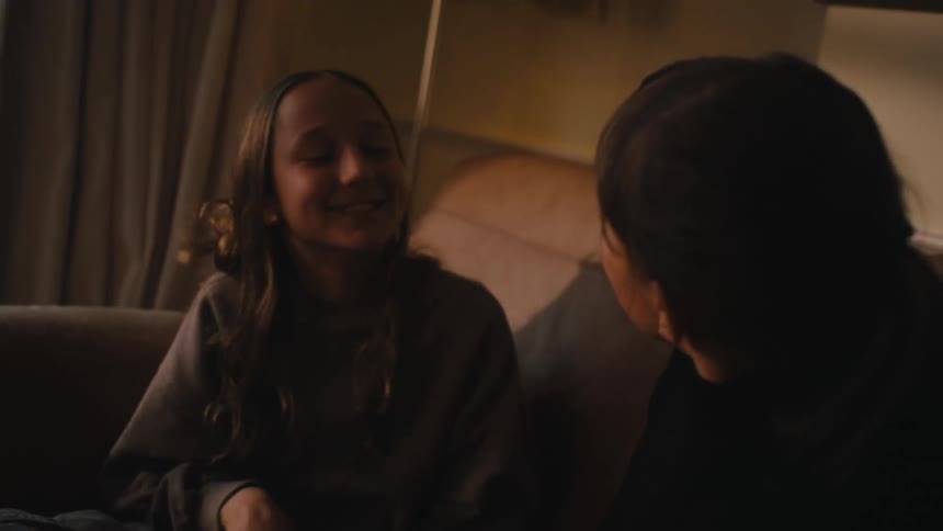 Little girls sitting and talking