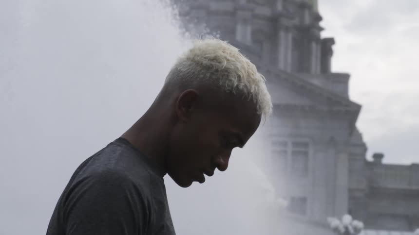 Side portrait of a man looking down