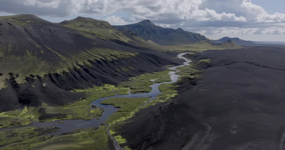 Mountainous landscape in a valley and a winding river