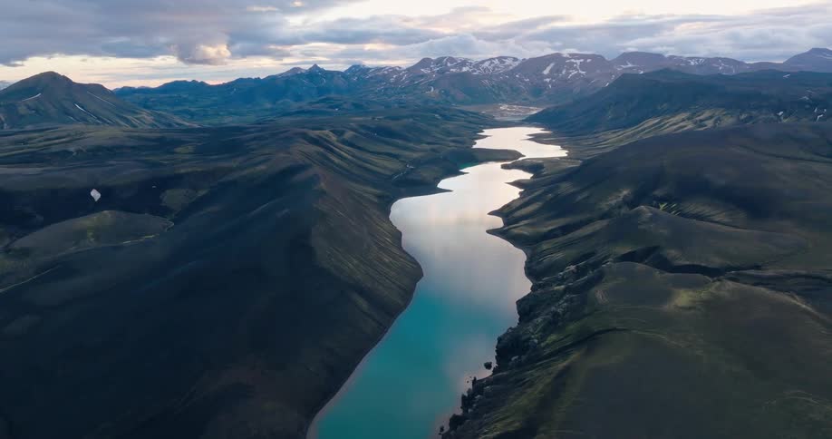Aerial panorama of a lake in the middle of a mountain valley