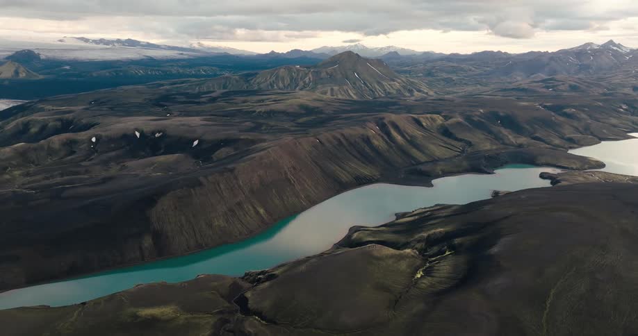 An aerial clip of a mountain and a river
