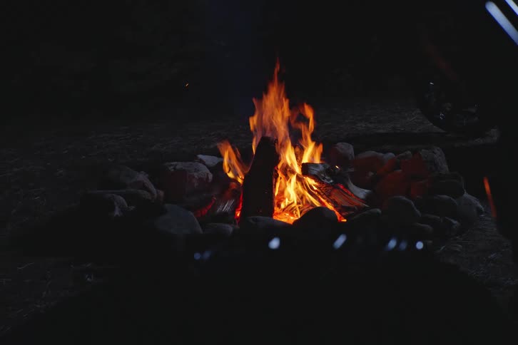 Fire burning in a natural location at night