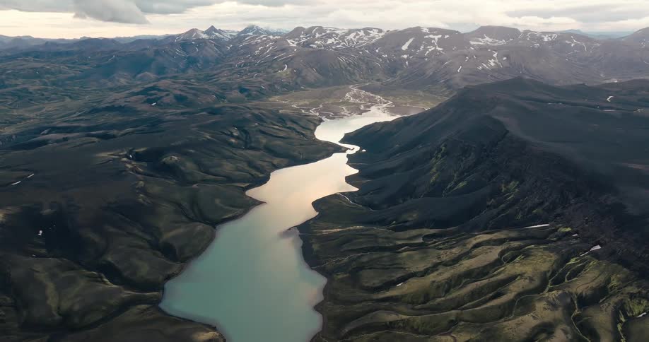 Aerial landscape of a mountain valley with a river in the center