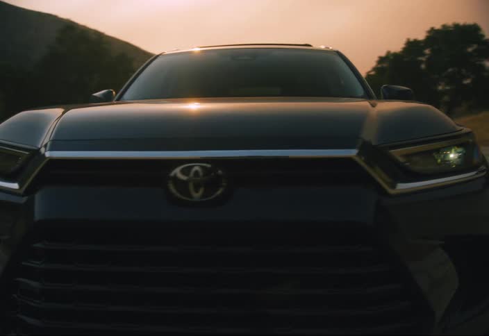A car driving down a street in close-up