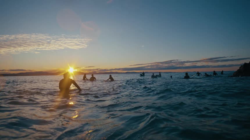 A clip of people swimming in the sea