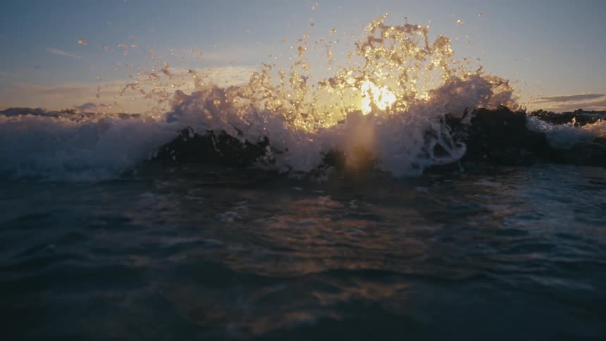 A clip of splashing water by the shore