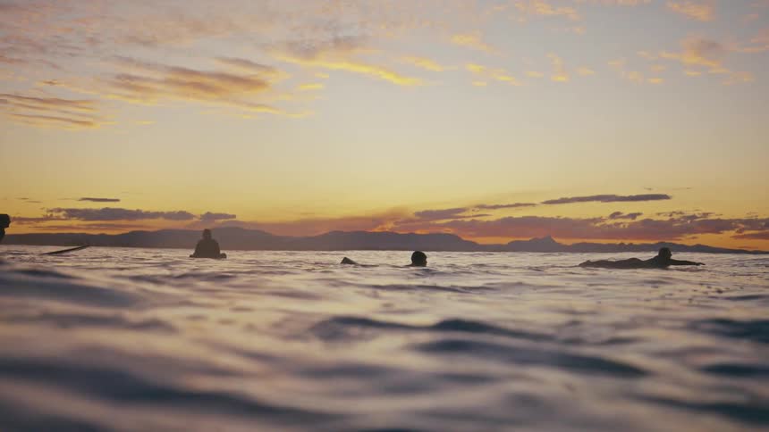 A clip of people swimming in the sea