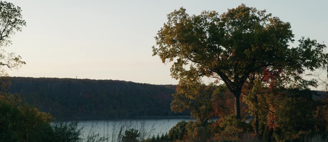 Landscape of a lake with wooded mountains