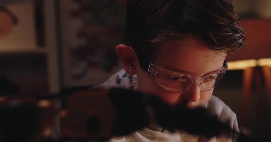 A clip of a focused kid writing
