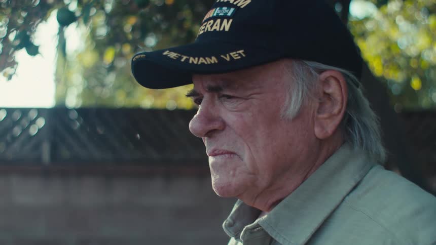 A clip of an old man contemplating